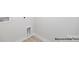 Small laundry room features wood look flooring at 1031 Hostler Ln, York, SC 29745