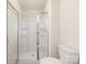 Bathroom with a sliding glass door shower and white fixtures at 1055 Doran Ter, Richburg, SC 29729