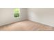 This bedroom features neutral walls, a bright window, and plush carpeting at 1055 Doran Ter, Richburg, SC 29729