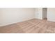 Bedroom features neutral carpeting, a large window, and fresh, neutral paint at 1055 Doran Ter, Richburg, SC 29729
