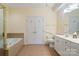 Bathroom featuring double vanity, and separate soaking tub at 1141 Ardwyck Pl, Rock Hill, SC 29730