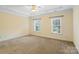 Spacious bedroom with trey ceiling and abundant natural light from the large windows at 1141 Ardwyck Pl, Rock Hill, SC 29730