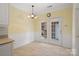 Charming eat-in kitchen with French doors and bead-board accents at 1141 Ardwyck Pl, Rock Hill, SC 29730