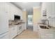 Beautiful white kitchen with tile flooring and stainless steel microwave at 1141 Ardwyck Pl, Rock Hill, SC 29730
