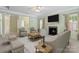 Well-staged living room featuring fireplace and comfortable seating at 1141 Ardwyck Pl, Rock Hill, SC 29730