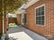 Brick patio featuring a slider door and large window for natural light at 1141 Ardwyck Pl, Rock Hill, SC 29730