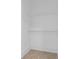 Closet with neutral carpet and wire shelving at 115 W 5Th Ave, Gastonia, NC 28052