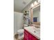 Stylish bathroom featuring a modern vanity with pink cabinets, new fixtures, and tiled floors at 136 Elba Dr, Mooresville, NC 28115