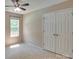 Bright, airy bedroom with large window and closet, perfect for a restful retreat at 136 Elba Dr, Mooresville, NC 28115