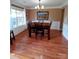 Traditional dining room with a chandelier, wainscoting and a wooden table set at 136 Elba Dr, Mooresville, NC 28115