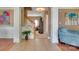 Welcoming foyer with decorative columns, hardwood floors, staircase, and stylish decor for a grand entrance at 136 Elba Dr, Mooresville, NC 28115