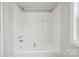 Bathroom showcasing a white tiled shower and tub combination at 137 S Penny St, Lancaster, SC 29720