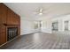 Spacious living room featuring a fireplace, wood-look flooring, and an open-concept design at 137 S Penny St, Lancaster, SC 29720