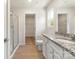 Bathroom featuring a walk-in shower, granite countertop, and an adjacent walk-in closet at 1542 Doran Ter, Richburg, SC 29729