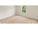 Cozy bedroom with neutral carpet and window with outdoor view at 1544 Doran Ter, Richburg, SC 29729