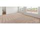 Spacious bedroom with neutral carpet, large windows, and ample natural light at 1544 Doran Ter, Richburg, SC 29729