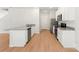 Well-lit kitchen with granite countertops, stainless steel appliances, and eat at bar at 1544 Doran Ter, Richburg, SC 29729
