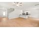 Open concept living room with easy access to kitchen and staircase at 1544 Doran Ter, Richburg, SC 29729