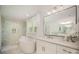 A luxurious bathroom features double vanity, soaking tub, sleek fixtures, and glass enclosed shower at 16432 Here At Last Ln, Charlotte, NC 28278