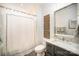 Bathroom features elegant vanity with marble countertop, decorative wall art, and a stylish shower curtain at 16432 Here At Last Ln, Charlotte, NC 28278