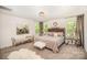 Bright and airy main bedroom featuring plush carpet, and sophisticated decor at 16432 Here At Last Ln, Charlotte, NC 28278