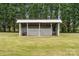 Open-sided shelter providing ample space for storage or animals in a well-maintained area at 1720 Lowe Dr, Catawba, NC 28609