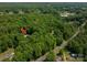 Lush treed lot with cozy home and in-ground pool for outdoor enjoyment at 174 Buena Vale Dr, Gastonia, NC 28056