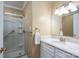 Bathroom showcasing vanity with solid surface countertop and enclosed shower at 174 Buena Vale Dr, Gastonia, NC 28056