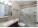 Bathroom featuring granite vanity and glass enclosed shower with grab bars at 174 Buena Vale Dr, Gastonia, NC 28056