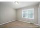 Neutral bedroom with light-colored carpet and a window offering ample natural light at 174 Buena Vale Dr, Gastonia, NC 28056