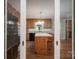 Traditional kitchen with wood cabinets, granite countertops, and island with seating at 174 Buena Vale Dr, Gastonia, NC 28056