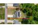 Aerial view showing the property's location within a neighborhood, highlighting its yard, deck, and solar panels at 208 N Kayla Dr, Salisbury, NC 28146