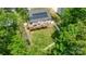 Elevated aerial view showing the property with a deck, fenced in yard, and solar panels on the roof at 208 N Kayla Dr, Salisbury, NC 28146