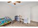 A bedroom with wood-look flooring, white walls, and a window provides a serene space at 208 N Kayla Dr, Salisbury, NC 28146