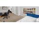 A comfortable bedroom features plush carpet, built-in shelving, and ample space at 208 N Kayla Dr, Salisbury, NC 28146