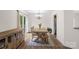 Charming dining room featuring a stylish table, chandelier, and sliding door at 208 N Kayla Dr, Salisbury, NC 28146