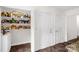 Walk-in pantry with lots of shelving and storage space next to a doorway at 208 N Kayla Dr, Salisbury, NC 28146