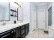 Bathroom featuring a double sink vanity, white tile floors, and a shower/tub combo at 2289 Veery Ln, Rock Hill, SC 29732