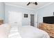 Comfortable bedroom with neutral walls, wood dresser, and ample natural light at 2289 Veery Ln, Rock Hill, SC 29732