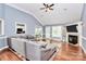 Spacious living room with hardwood floors, vaulted ceilings, a fireplace, and plenty of natural light at 2289 Veery Ln, Rock Hill, SC 29732