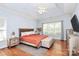Spacious main bedroom featuring vaulted ceilings, hardwood floors, and a serene, light-filled ambiance at 2289 Veery Ln, Rock Hill, SC 29732