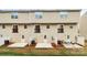 Townhome backs to green space with a patio for outdoor dining and entertaining at 2635 Mccurdy Trl, Charlotte, NC 28269