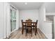 Dining area featuring a wooden table and chairs, bright space for Gathering meals at 2635 Mccurdy Trl, Charlotte, NC 28269