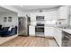 Well-equipped kitchen with stainless steel appliances and stylish backsplash at 2635 Mccurdy Trl, Charlotte, NC 28269