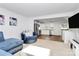 Open-concept living area with combined kitchen and living room; bright and airy atmosphere at 2635 Mccurdy Trl, Charlotte, NC 28269