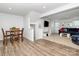 Open living and dining area with hardwood floors, and ample space for entertaining at 2635 Mccurdy Trl, Charlotte, NC 28269