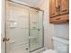 Bathroom featuring a glass-enclosed shower and a toilet at 2919 Peachwood Ct, Fort Mill, SC 29715