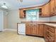 Kitchen featuring wooden cabinets, countertops, a stainless steel sink and dishwasher at 2919 Peachwood Ct, Fort Mill, SC 29715