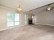 Expansive living room with stone fireplace, vaulted ceiling and ample natural light at 2919 Peachwood Ct, Fort Mill, SC 29715