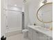 This bathroom features a tub/shower, white tile, and a modern vanity at 2954 Holbrook Rd, Fort Mill, SC 29715